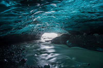 The wonderful colors of blue ice in the ice caves of vatnajokull, europe's largest glacier