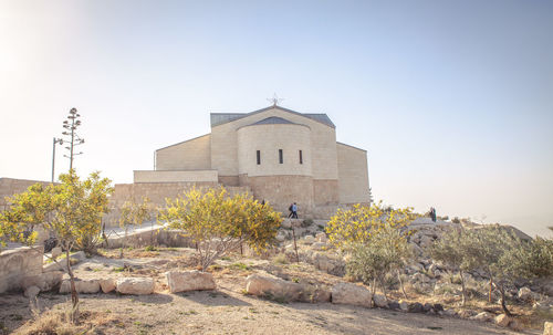 Exterior of historic building against clear sky