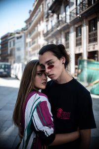 Happy couple standing outdoors