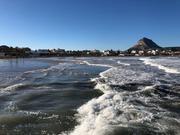 Scenic view of sea against clear sky