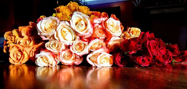 Close-up of roses on table