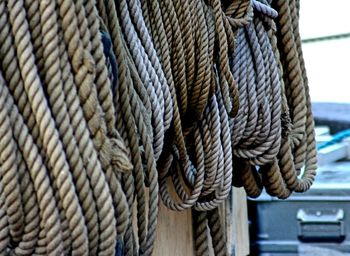 Close-up of rope tied to bollard