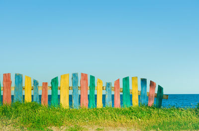 Scenic view of landscape against clear blue sky