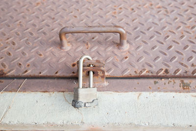 Padlocks on metal gate