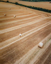 High angle view of woman standing on field