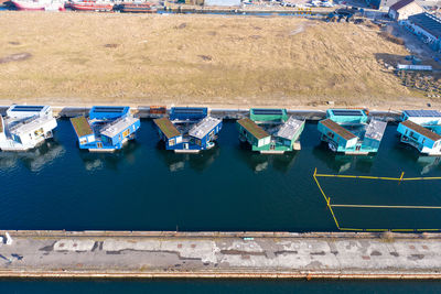 High angle view of boats moored at harbor