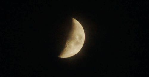 Low angle view of moon in sky