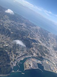 Aerial view of landscape and mountains against sky
