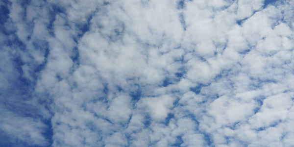 Low angle view of clouds in blue sky