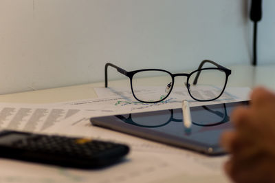 Close-up of eyeglasses on table