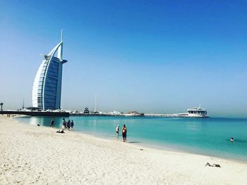 View of beach against clear sky