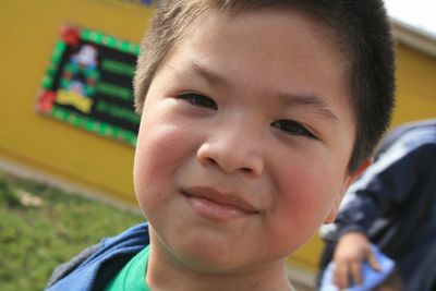 Close-up portrait of smiling boy