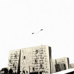 Low angle view of buildings against clear sky