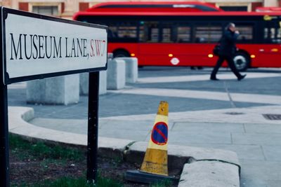 Road sign on street in city