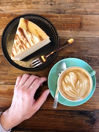 High angle view of coffee cup on table