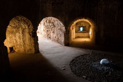 Illuminated lighting equipment on rock in building