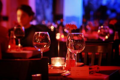 Wine glasses on table at restaurant