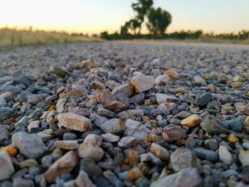 Surface level of pebble and stones at sunset