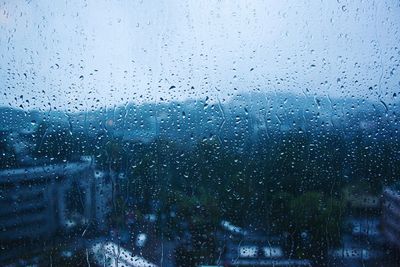 Close-up of water drops on glass