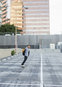 Young man skateboarding.