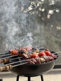 Close-up of meat on barbecue grill