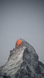 Low angle view of mountain against clear sky