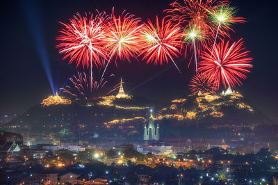 Firework display at night