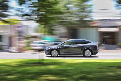 Blurred motion of car on road