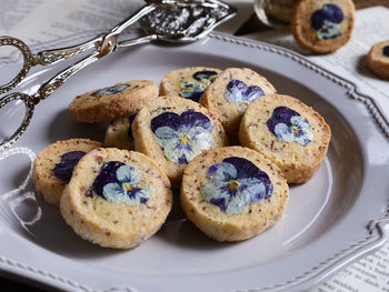 Close-up of cookies in plate on table