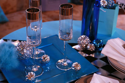 Close-up of wineglasses on table