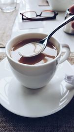 Close-up of coffee cup on table