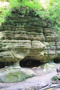 Woman standing on rock formation