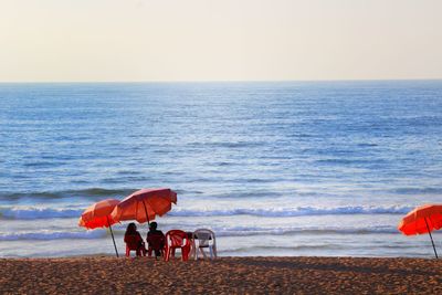 Scenic view of beach against clear sky