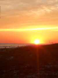 Scenic view of sea at sunset