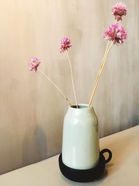 Close-up of flower vase on table