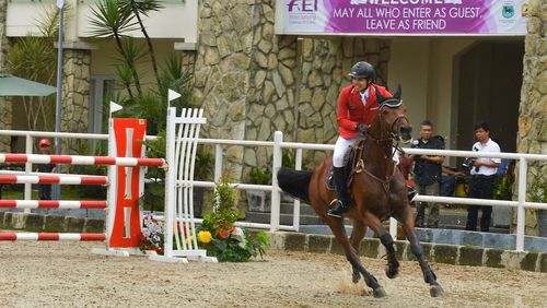 Men standing against wall