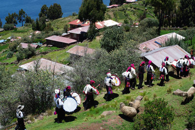Men of taquile playing the drums for the carnaval