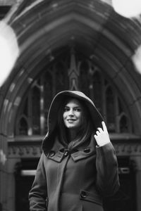 Close up positive woman in old town monochrome portrait picture