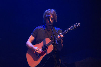 Young man playing guitar