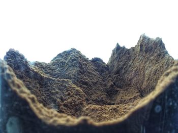 Close-up of mountain range against clear sky