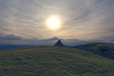 View of landscape against cloudy sky