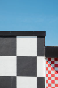 Low angle view of building against blue sky