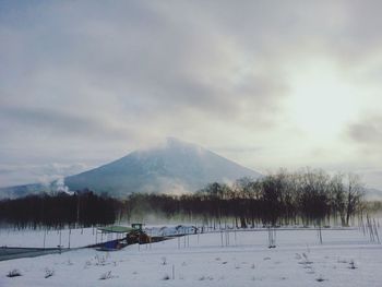 Scenic view of mountains against sky during winter