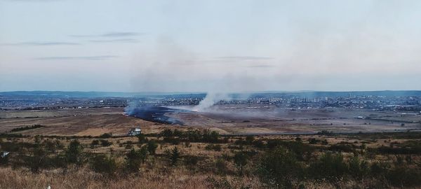 Scenic view of land against sky