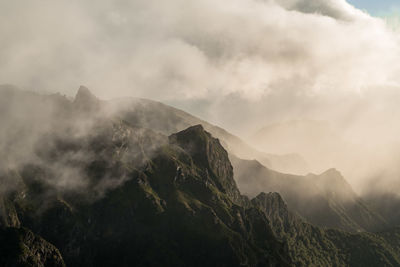 Scenic view of mountains against sky