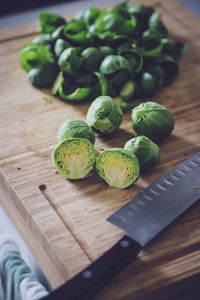 High angle view of brussels sprout on cutting board