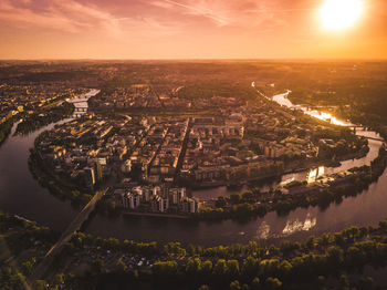 High angle view of river amidst buildings in city