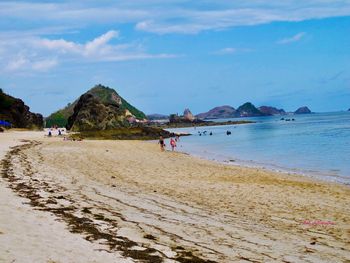 Scenic view of beach against sky