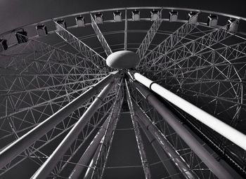 Low angle view of illuminated ferris wheel