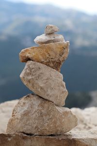 Close-up of stone stack on rock